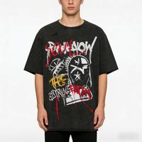 T-shirt streetwear personnalisé vintage délavé, coupe oversize avec imprimé graffiti tête de mort et design à trous déchirés