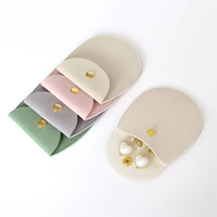 Pochettes à bijoux en microfibre gaufrée à boutons-pression, sacs en velours multicolores pour boucles d'oreilles et bagues, directement de l'usine