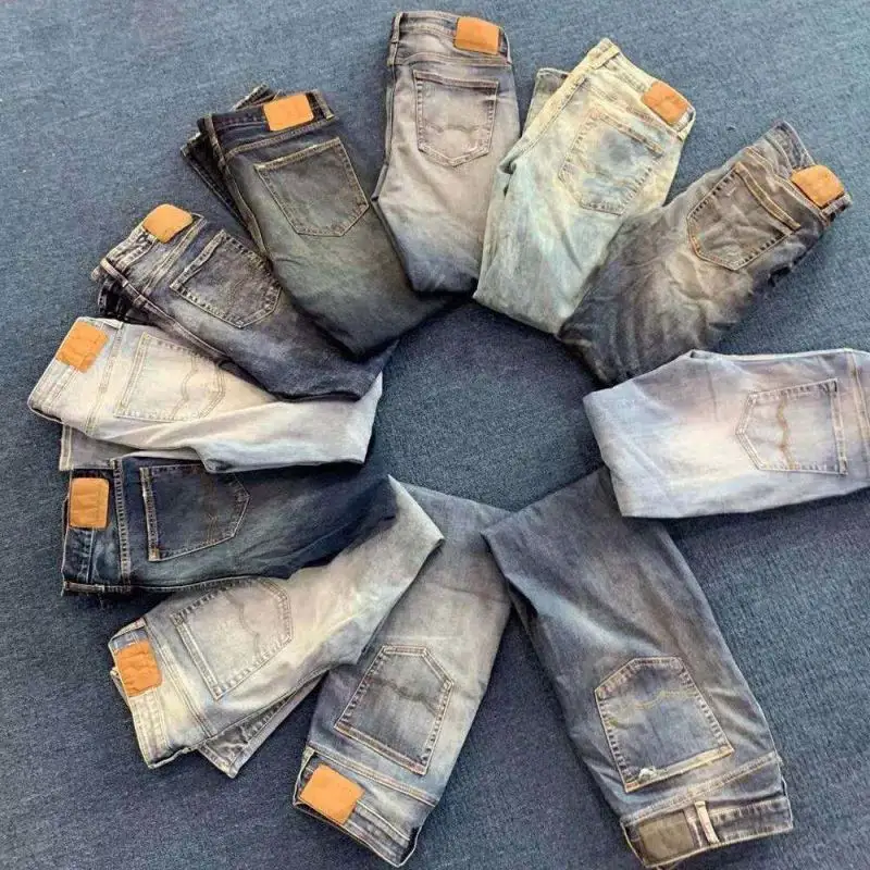 Grosir celana Jeans pria baru pabrik Tiongkok 2020 celana Jeans cetak pria stok banyak