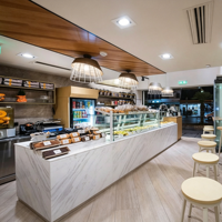 Comptoir de présentation de pain commercial haut de gamme sur mesure avec éclairage LED, design écologique, style marbre, vitrine de boulangerie pour les magasins de détail