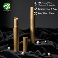 Tube de rouge à lèvres rond de luxe en plastique plaqué or brillant, conteneur de baume à lèvres, emballage cosmétique vide personnalisable en gros