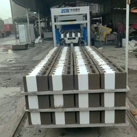 QTY7-15 Machine à fabriquer des blocs adoptant une structure de moulage hydraulique pour une production durable de briques en ciment