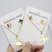 Bijoux INS Tendance en Acier Inoxydable, Parure de Bijoux Fleur Plaqué Or 18K avec Collier Pendentif et Boucles d'Oreilles au Motif Irrégulier