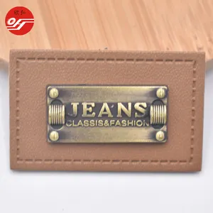 Hoogwaardige Custom Ontwerp Reliëf Lederen Patch Met Metallic Logo Voor Jeans