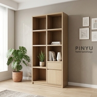 Armoire de chambre à coucher pleine hauteur avec fond en marbre noir et chêne clair, double niveau ouvert pour rangement de livres