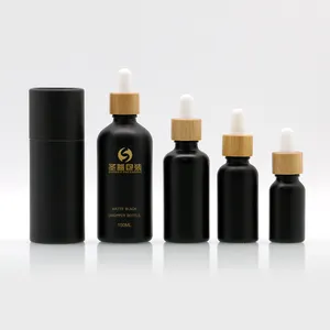 Kosmetik verpackung Matt Finished Black Frost ätherisches Öl Serum CBD Öl Kräuter Hanf Glas Tropf flasche mit Bambus kappe