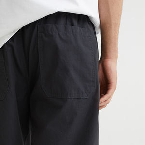 Pantalones cortos de gimnasio para hombre, 100% algodón, cintura ajustable y cordones, patrón sólido, ecológico - Product Image 5