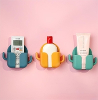 Boîte de rangement murale multifonctionnelle en plastique pour le chargement des téléphones portables Étagère pour télécommandes de téléphones portables Support pour petits objets