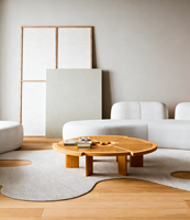 Canapé modulaire incurvé de luxe en cuir PU crème, style moderne et minimaliste, avec coussins ronds, pour salon, centre commercial et hôtel