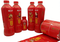 Label Shrink Film PVC/PET/OPS Hot Melt OEM ODM untuk Botol Minuman Bir, Air Mineral, dan Gelas