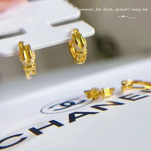 Xinfly 18K Gold Bow-Shaped Diamond Stud <b>Huggie</b> Earrings Luxury Classic Style for Weddings Parties Lovely Gift for Women Girls - Product Image 1