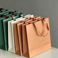 Sac en carton épais blanc à prix de gros, logo personnalisé gaufré/imprimé, capacité de 6-9 kg pour la revente en gros aux boutiques