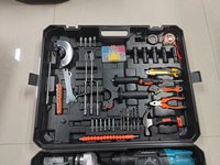 Outil électrique 4-en-1 avec batterie au lithium 21V, comprenant perceuse électrique, marteau électrique, clé à chocs, meuleuse d'angle, scie et accessoires.
