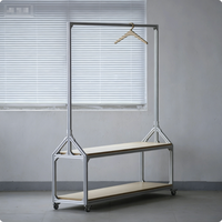Porte-vêtements sur pied en aluminium, présentoir de rangement minimaliste en panneau éco-responsable pour vêtements
