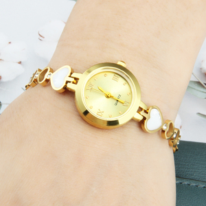 Orologio elettronico al quarzo da <span class=keywords><strong>donna</strong></span> <span class=keywords><strong>alla</strong></span> <span class=keywords><strong>moda</strong></span> accessori per gioielli con numeri romani rosa cavi 18K oro acciaio inossidabile orologio da polso - Product Image 3