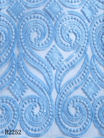 2252 Vente en gros de tissus en dentelle à sequins de lait nigérians bleu ciel, dentelle filet brodée africaine, offre spéciale