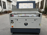 Machine de gravure/découpe laser Haotian HT-690 avec type de portique à pieds pour le bois, le caoutchouc, les magasins de détail, les hôtels, prend en charge les formats AI, BMP, PLT