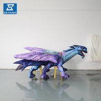Modèle de dinosaure à ailes violettes gonflable personnalisé pour exposition en plein air au parc jurassique, publicité commerciale, décoration