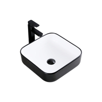 Lavabo de salle de bain ovale en céramique moderne et écologique, finition noire, pour hôpitaux et hôtels