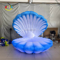 Coquille gonflable de scène de décoration de coquillage gonflable géante personnalisée avec lumière LED pour la fête de mariage