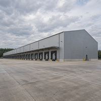 Entrepôt en structure acier sur mesure, atelier métallique haute performance, bâtiment résistant aux intempéries, centre de distribution logistique industrielle