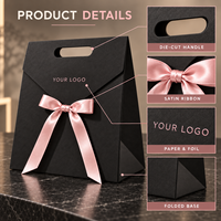Sac en papier mat noir personnalisé OEM ODM avec logo et nœud en ruban rose, emballage cadeau de luxe en carton pour boutique