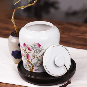 Tarro de cerámica Pu Yu redondo hermético con diseño de nueve melocotones para almacenar té verde, negro y Pu'er. - Product Image 2