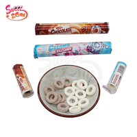 Bonbons compressés en forme de cercle au chocolat et à la crème, saveur sucrée