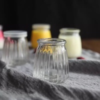 Bouteilles de pouding en verre résistant aux hautes températures 100ml 200ml couvercles en liège personnalisés en gros pour emballage de diffuseur de nouilles à la gelée