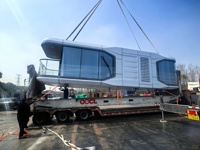 Capsule intelligente à énergie solaire de 40 pieds Cabine spatiale Petite maison Remorque Maison modulaire préfabriquée pour camping
