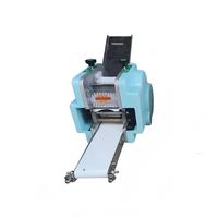 Machine automatique multifonction pour la fabrication de raviolis, de gyozas, de feuilles de raviolis, de wontons et de feuilles de rouleaux de printemps