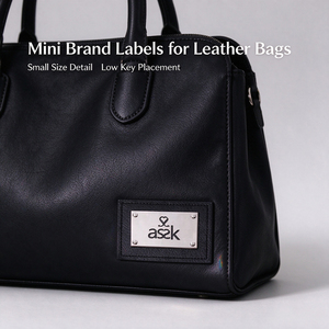 Étiquette métallique à coudre pour vêtements, étiquette métallique personnalisée avec logo en relief, plaque de marque métallique personnalisée OEM ODM - Product Image 1