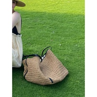 Nouveau chaud grande capacité décontracté plaine sac fourre-tout sac à main doux herbe naturelle tissé plage paille sac à la main femmes raphia sacs de plage