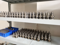Machine de remplissage et de sertissage de cartouches aérosols Bag-on-Valve pour l'emballage de liquides en spray