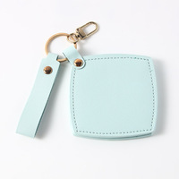 Porte-clés miroir rotatif carré en cuir, miroir cosmétique portable pour retouches de beauté et cadeaux promotionnels, miroir de maquillage de voyage