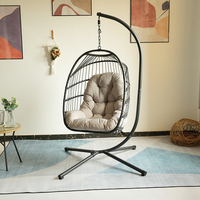 Fauteuil suspendu œuf de patio avec cadre de panier pliable, base croisée à quatre pieds et coussin capitonné