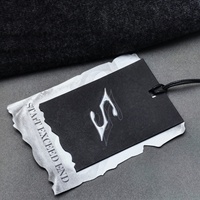 Étiquettes de vêtements personnalisées de luxe, papier spécial réfléchissant irisé au laser avec techniques UV, écologiques, chapeaux, vêtements
