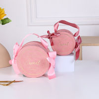 Boîte à bonbons ronde en chocolat avec logo personnalisé ODM OEM, conception gratuite, boîte estampée à chaud avec poignée