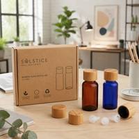 Botella de Vidrio Ámbar Azul de 30 ml Personalizada de Primera Calidad para Aceites Esenciales con Tapa de Bambú, Envase Ecológico y Sostenible para Aromaterapia al por Mayor