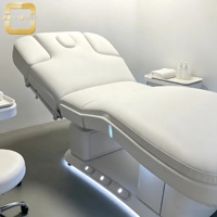 Lit de beauté électrique haut de gamme avec éclairage LED décoratif, élévateur motorisé et fonction inclinable pour centre de beauté commercial