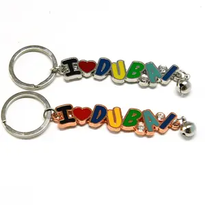 Factory in stock dubai embossed keychain travel souvenirs zinc alloy craft metal key chain