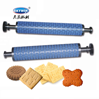 Rouleau de moulage pour biscuits et gâteaux en métal de haute qualité avec performance stable pour machine à biscuits, ligne de production de biscuits