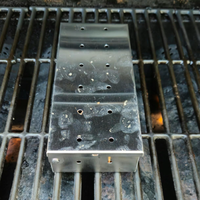 La boîte à barbecue et à fumage en acier inoxydable pour les grils à gaz et les grils au charbon de bois peut être utilisée pour stocker des copeaux de bois pour barbecue