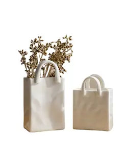 Jarrón de cerámica minimalista para decoración del hogar, jarrón de bolso creativo con diseño de flores para escritorio, bolsa hecha a mano