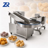 Machine à grande capacité pour la fabrication de gâteaux de lune, de boules de riz glutineux et de boules de sésame, et machine à enrober de sésame