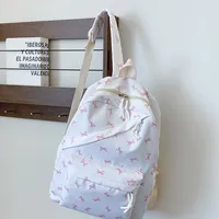 Sac à dos pour ordinateur portable tendance et mignon avec imprimé nœud, fermeture éclair, bretelles réglables, protection pour ordinateur portable, idéal pour la rentrée scolaire