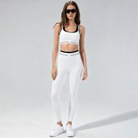 Ensemble de vêtements de sport pour femmes, super tendance, personnalisé, pour le yoga et la gym, avec soutien-gorge de sport et leggings contrastés