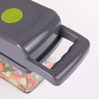 Multifunctionele handmatige plastic voedselveilige 6-in-1 fruit- en groentesnijder keukenhulpje