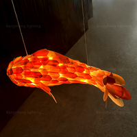 Suspension LED nordique moderne avec design de poisson créatif pour la décoration intérieure de villas hôtels ou de restaurants intérieurs