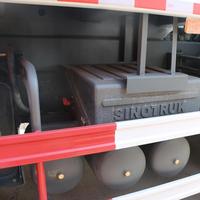 Camion benne HOWO d'occasion inspecté, 371 CV, 6x4, benne en U, basculement central, pour services d'enterrage de déchets